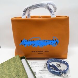 Orange Tote with blue handles